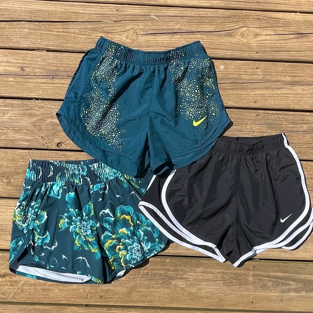 3 pairs: Nikes (small) and Avia (Xs) running shorts NWOT